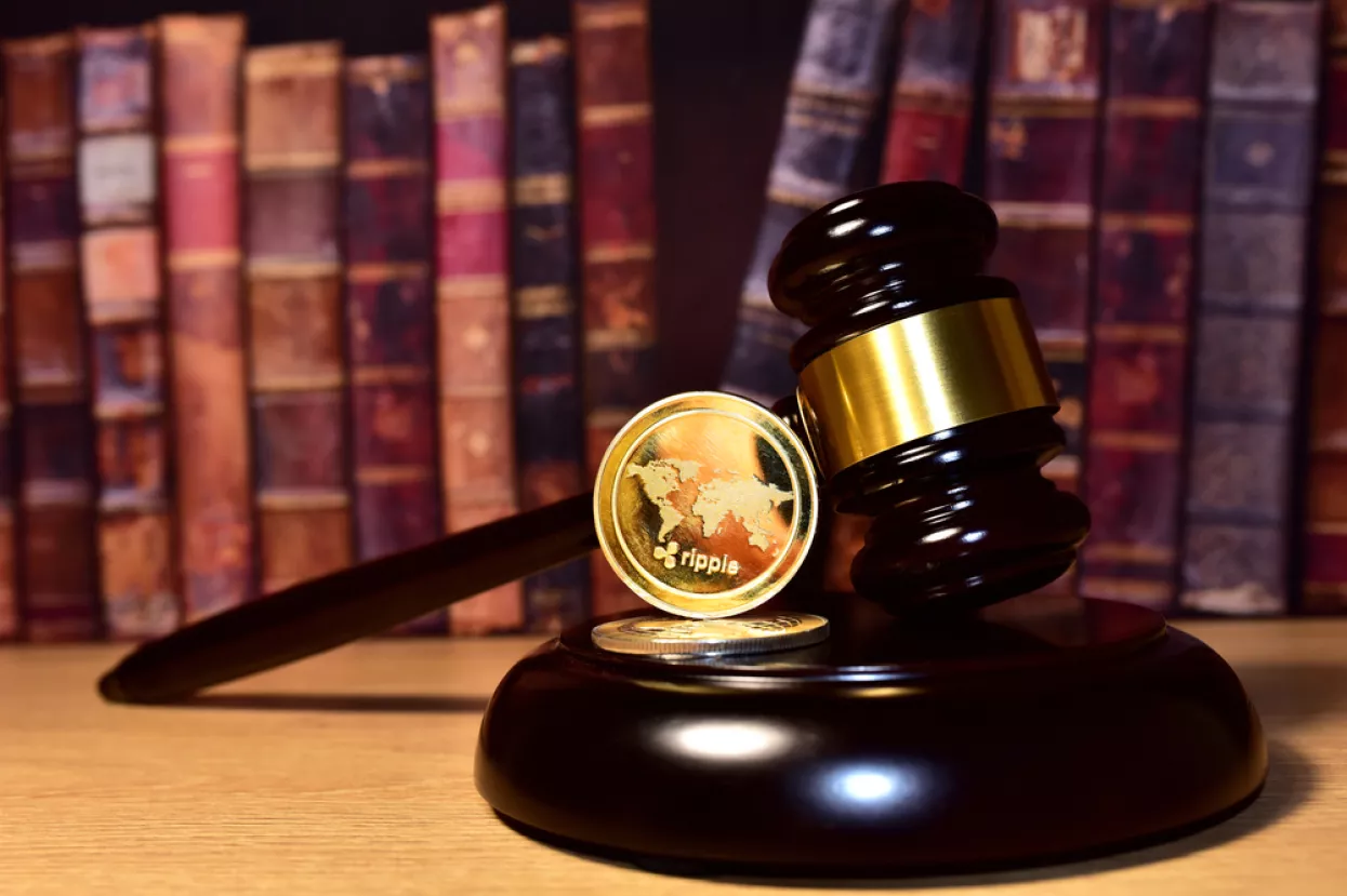 Judge hammer and XRP crypto coin. Justice courtroom. Ripple demands Bitcoin and Ethereum docs from SEC amid legal fight. Delist &Ntilde;�ryptocurrency trading. Exchanges and traders. law to ban blockchain<br>ripple SEC