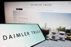 Stuttgart, Germany - 06-25-2022Smartphone with logo of automotive company Daimler Truck Holding AG on screen in front of business website. Focus on center-left of phone display. Unmodified photo.
