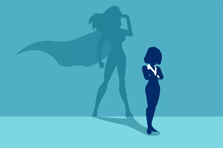 Vector of a strong business woman with a shadow imagining to be a super hero looking aspired.<br>žena, samopouzdanje, samopo&scaron;tovanje, žene u biznisu