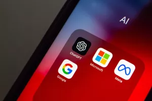 Vancouver, CANADA - Feb 27 2023 ChatGPT, an AI chatbot developed by OpenAI, with Microsoft, Meta Platforms and Google icons seen in an iPhone. Generative AI technology and Big Tech conceptual image<br>umjetna inteligencija