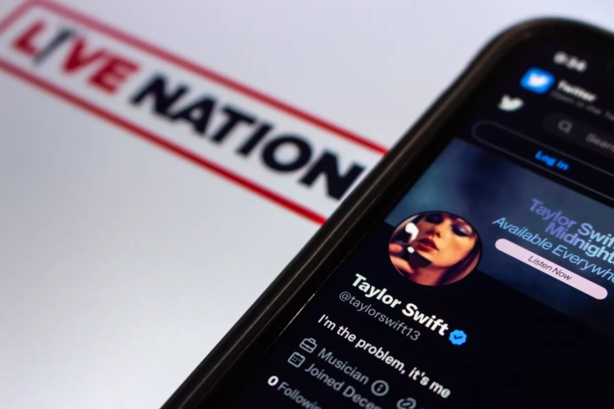 Vancouver, CANADA - Dec 3 2022 Twitter account of popular US singer-songwriter Taylor Swift in Twitter website seen in iPhone on Live Nation logo background. Selective focus, Ticketmaster