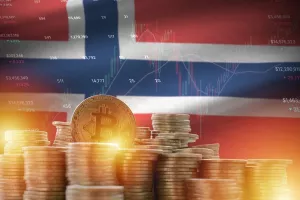Norway flag and big amount of golden bitcoin coins and trading platform chart. Crypto currency conceptNorve&scaron;ka, bitcoin, novac, rast 