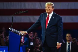 NATIONAL HARBOR, MD, USA- February 24, 2024 Donald Trump speaks at an event about his plan for defeating current President Joe Biden in November.