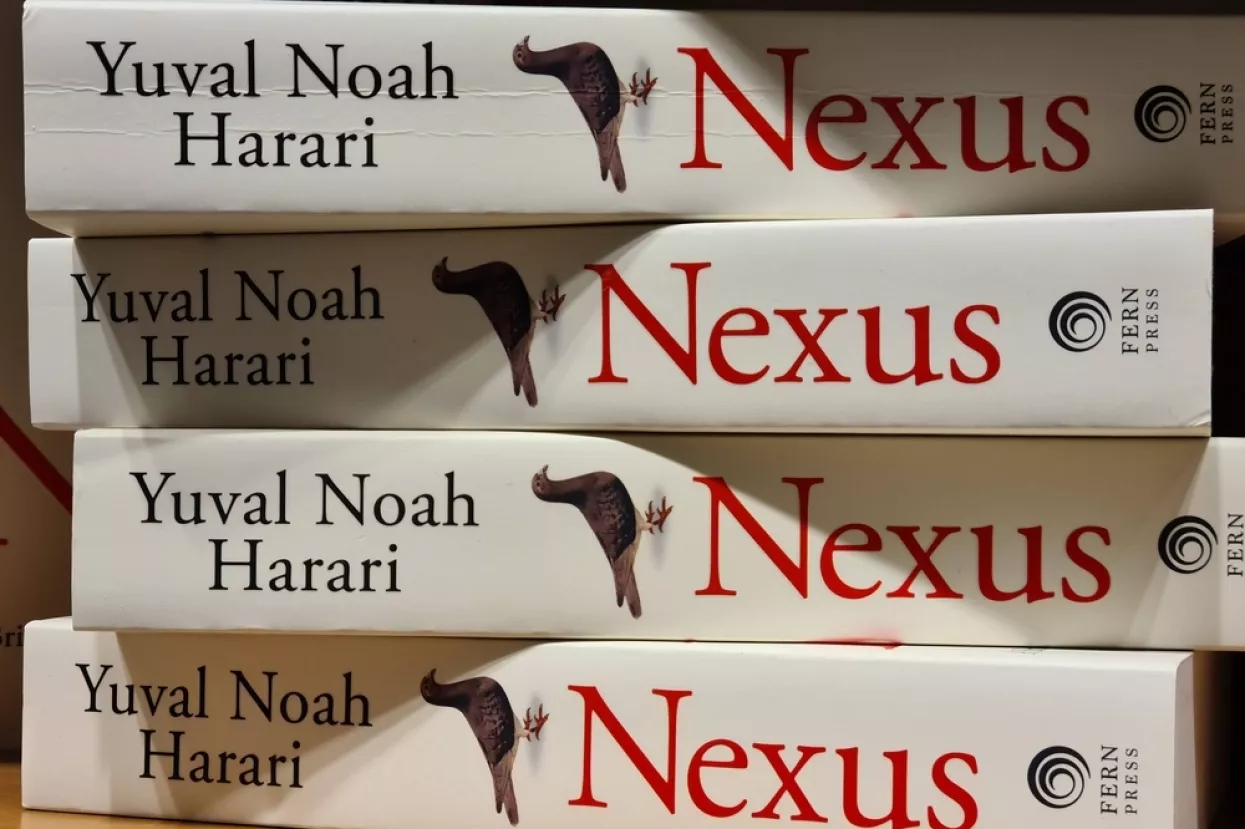 Linz, Austria. September 24, 2024. The Bestseller. Nexus authored by Yuval Noah Harari on a bookshelf at Thalia, a bookstore in Austria.