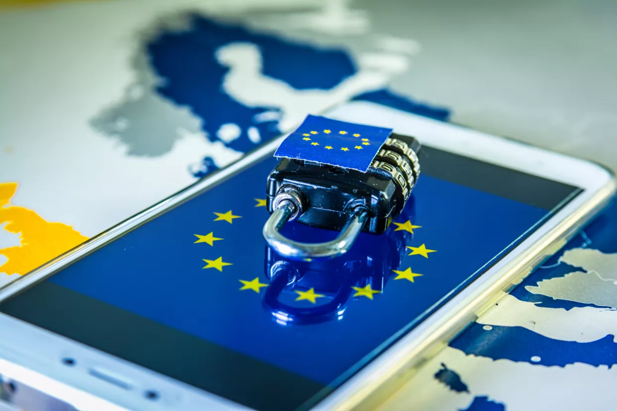 Padlock over a smartphone and EU map, symbolizing the EU General Data Protection Regulation or GDPR. Designed to harmonize data privacy laws across Europe.