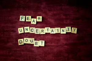 Blocks of 'Fear', 'Uncertainty', and 'Doubt', FUD concept in sales, marketing, public relations, politics, polling and cults.