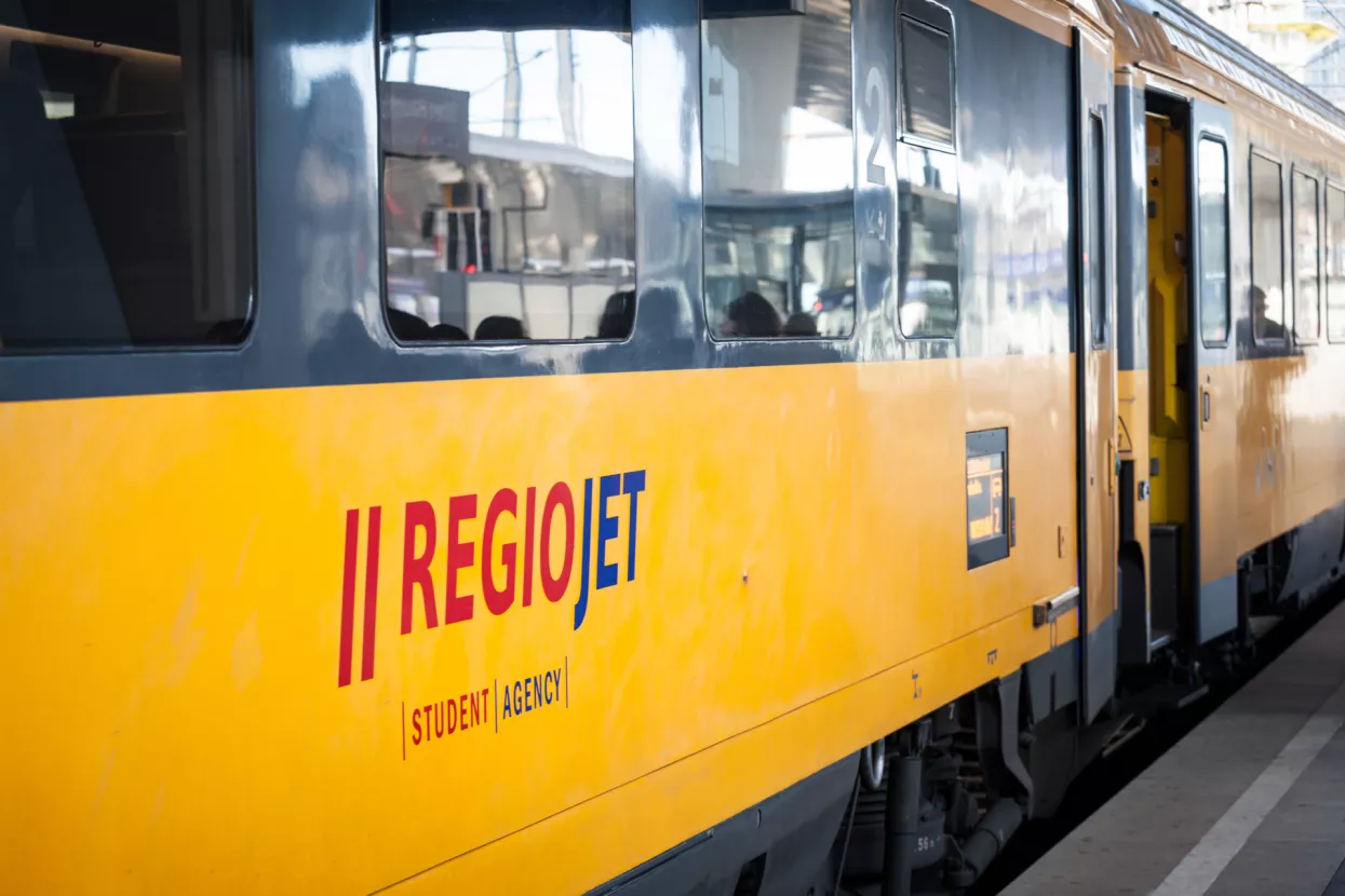 VIENNA, AUSTRIA - NOVEMBER 6, 2019Regiojet logo on passenger car of train belonging to the company. Part of Student Agency, Regiojet is a Czech private rail & bus transporation private company.